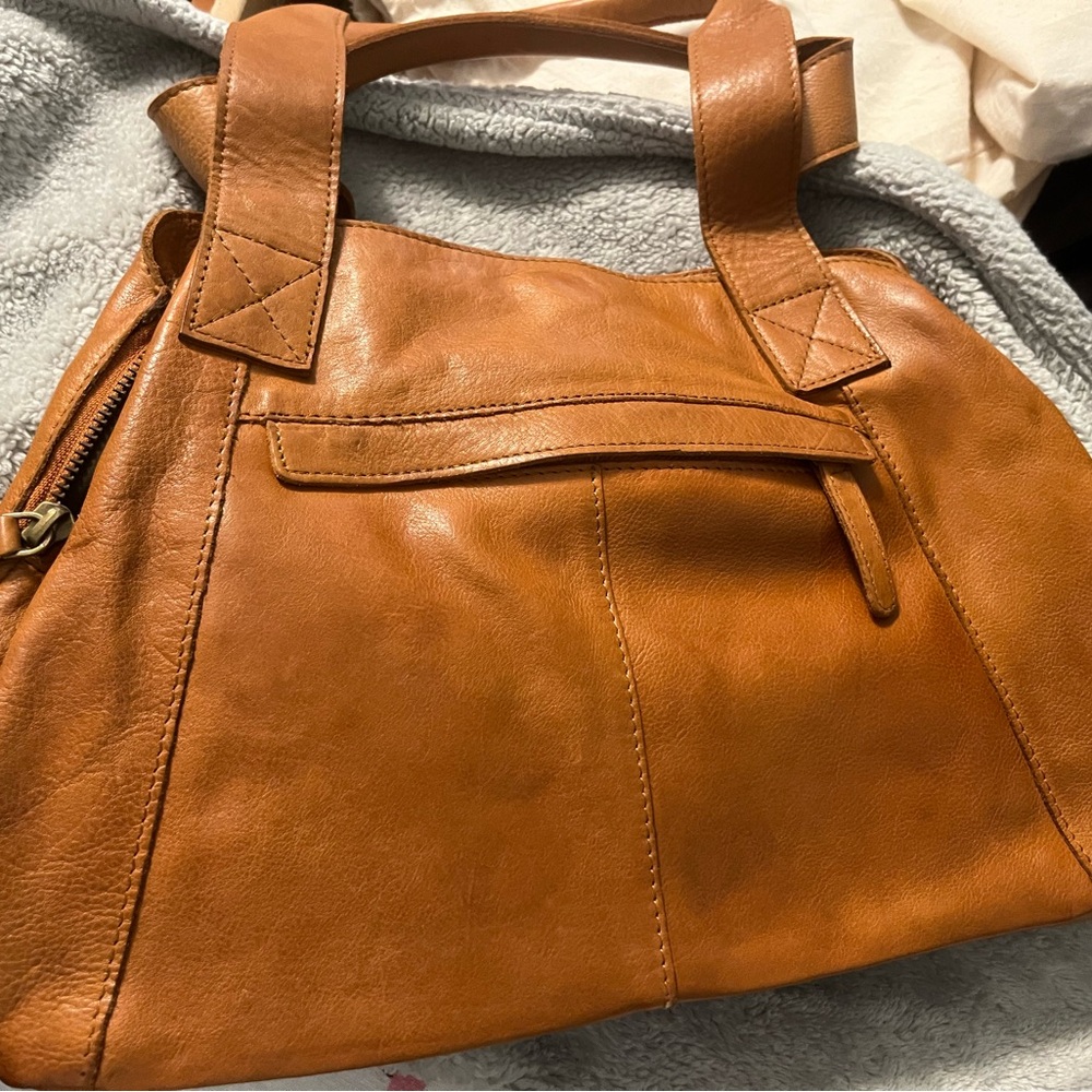 Elegant Vilenca Tan Leather Tote Bag—looks modeled after 70’s style